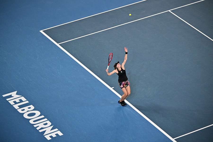 Kazakhstan's Elena Rybakina serves against Latvia's Jelena Ostapenko