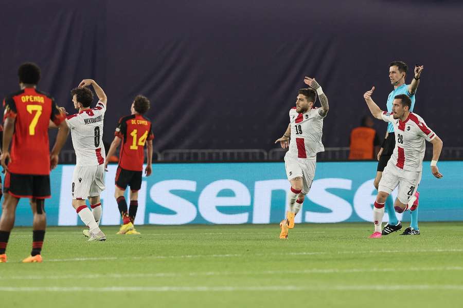 Georgian players celebrate making it 2-1