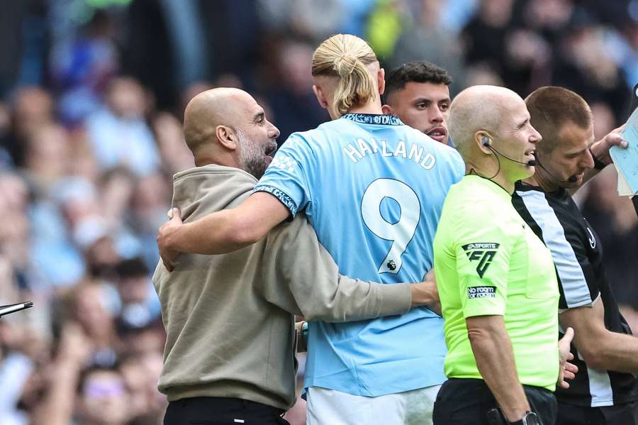 Pep Guardiola und Erling Haaland.