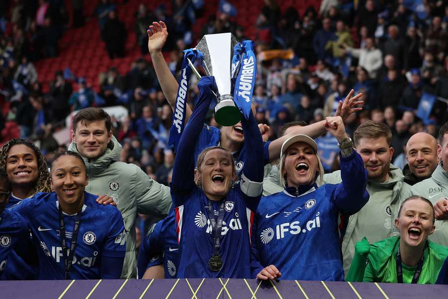 Chelsea raise the Women's League Cup trophy in Bristol at the weekend.