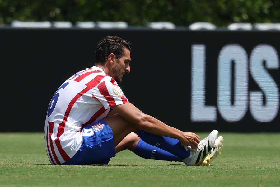 Atletico midfielder Koke reacts following their elimination from the tournament