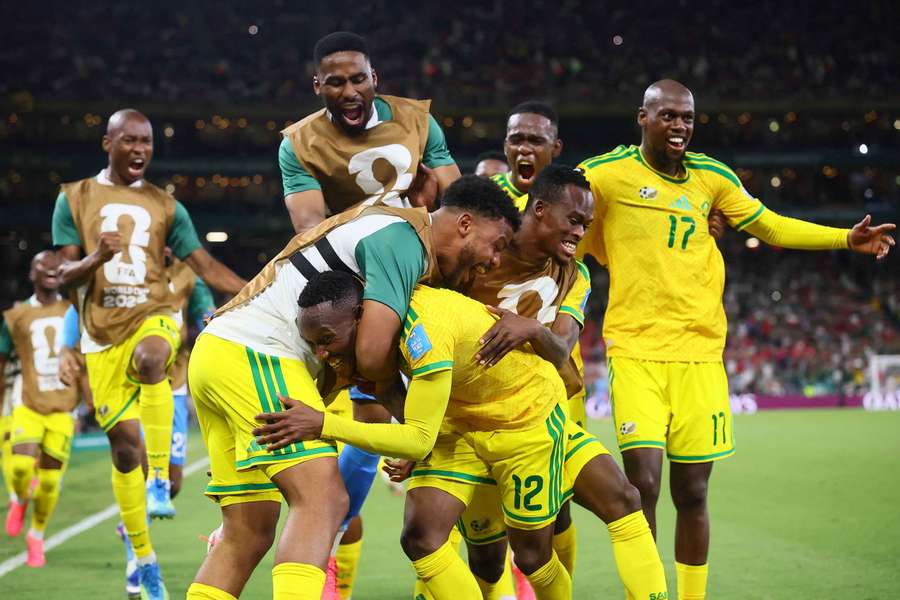 Thapelo Maseko and his teammates celebrate their opening goal against Korea Republic.