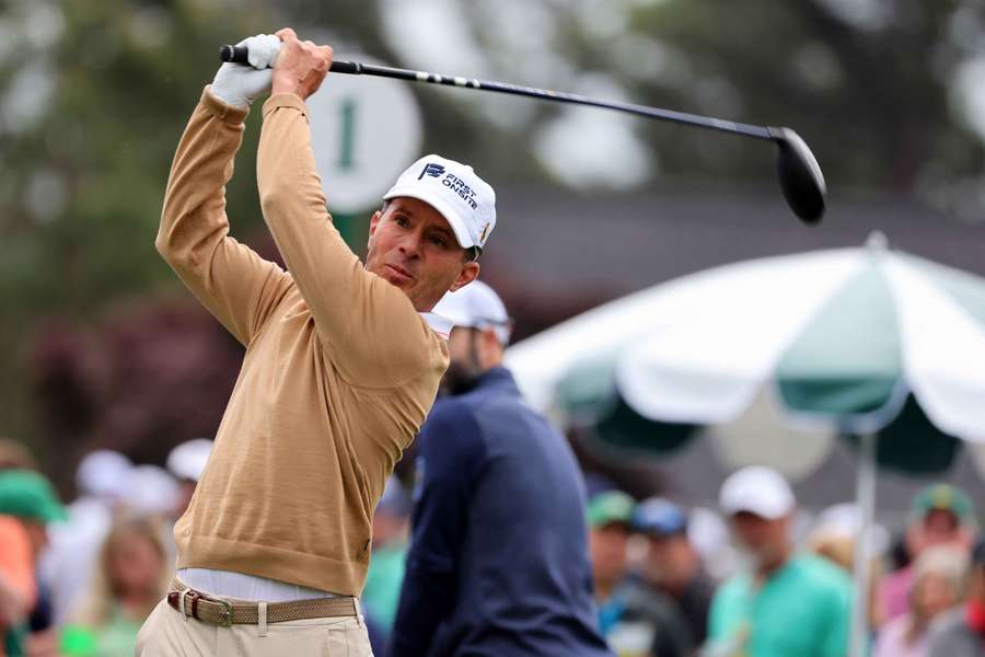 Canada's Mike Weir hits his tee shot on the first hole during a practice round