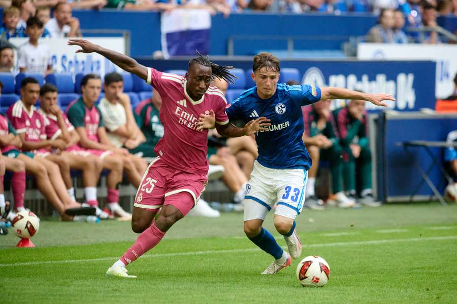 Yan Diomande (left) in action for Real Madrid against Schalke Yan Diomande (left) in action for Real Madrid against Schalke