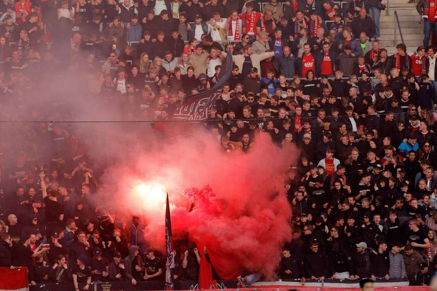 Home supporters broke through a fence and attacked the West Ham contingent seated in a reserved section