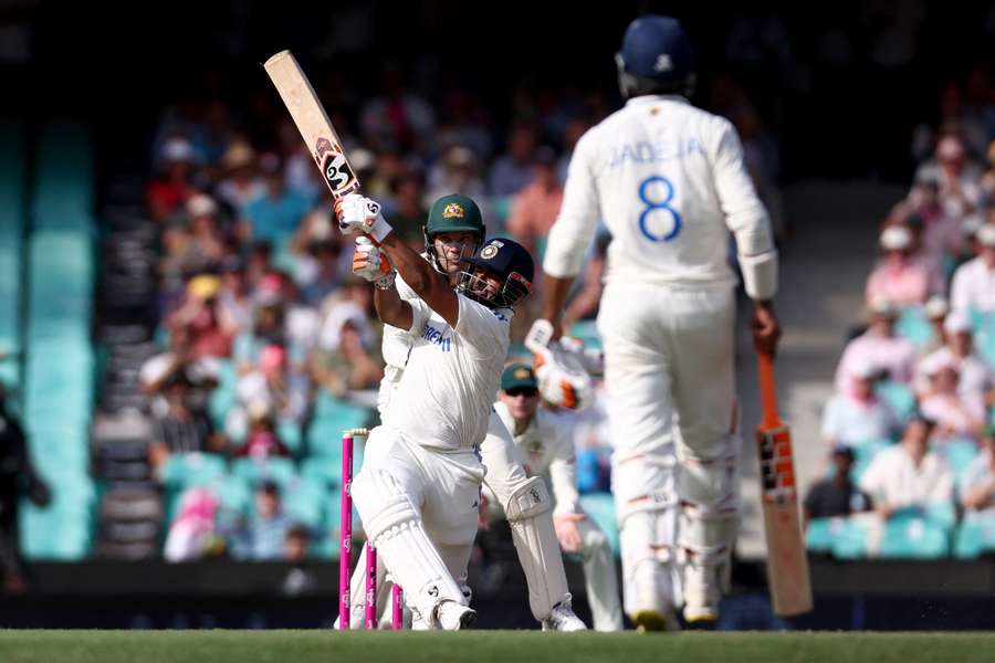 India's Rishabh Pant hits a boundary on day two of the fifth Test against Australia