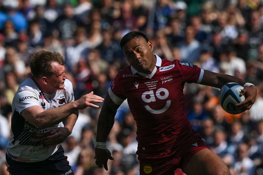 Tuilagi (R) runs with the ball during the Premiership final