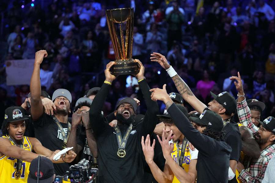 LeBron James lifts the NBA Cup