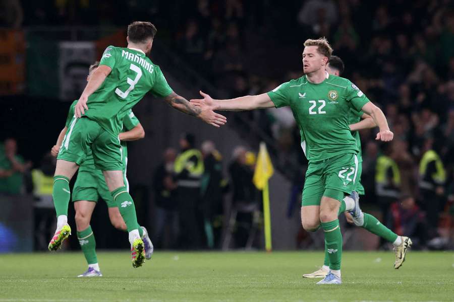 Republic of Ireland's defender #22 Nathan Collins celebrates the team's first goal Republic of Ireland's defender #22 Nathan Collins celebrates the team's first goal