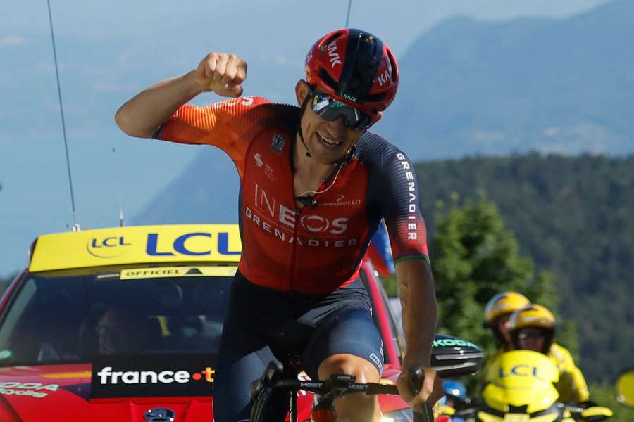 Michal Kwiatkowski punches the air after winning the 13th stage of the Tour on Bastille Day