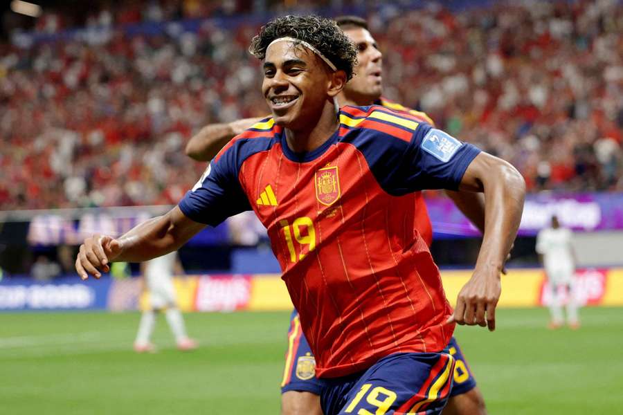Spain's Lamine Yamal celebrates scoring their first goal