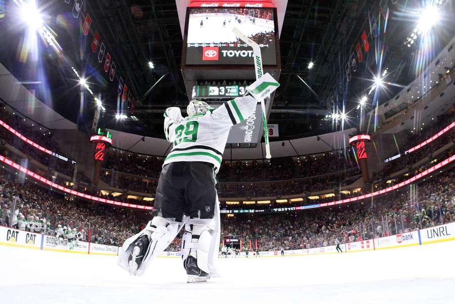 Dallas Stars player Jake Oettinger celebrates overtime win