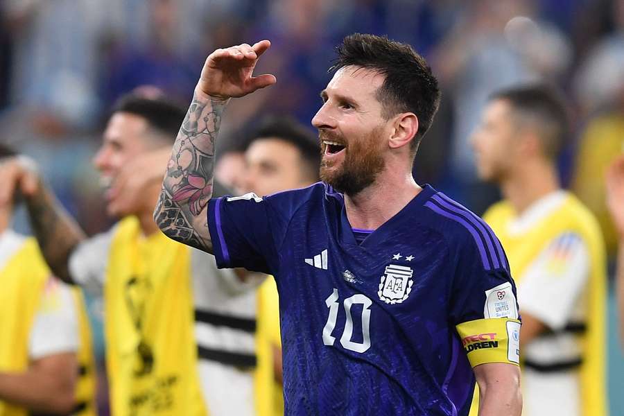 Lionel Messi salutes Argentina's fans after their win over Poland