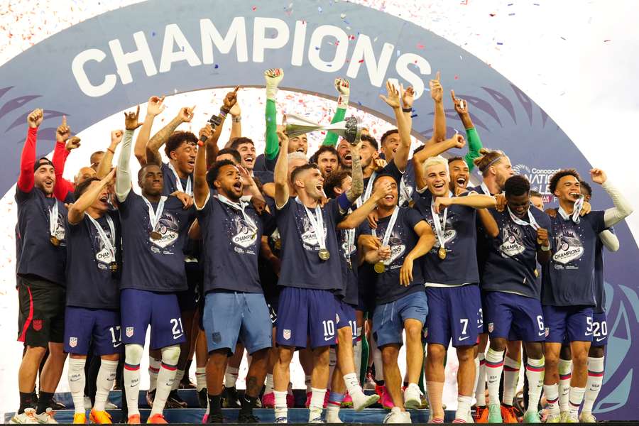 Christian Pulisic #10 of the United States holds up the trophy celebrating the win over Canada during the 2023 CONCACAF Nations League final Christian Pulisic #10 of the United States holds up the trophy celebrating the win over Canada during the 2023 CONCACAF Nations League final
