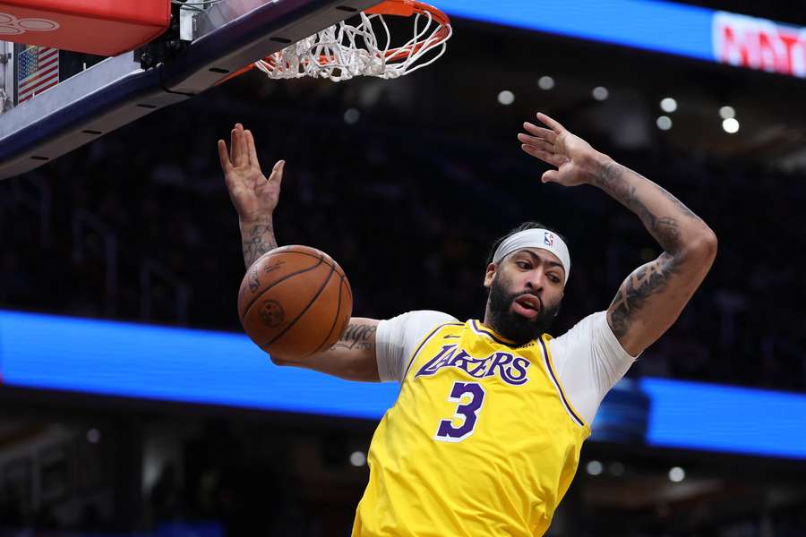 Los Angeles Lakers star Anthony Davis slams in a dunk in his team's 125-120 NBA victory at Washington, in which he had 35 points and 18 rebounds