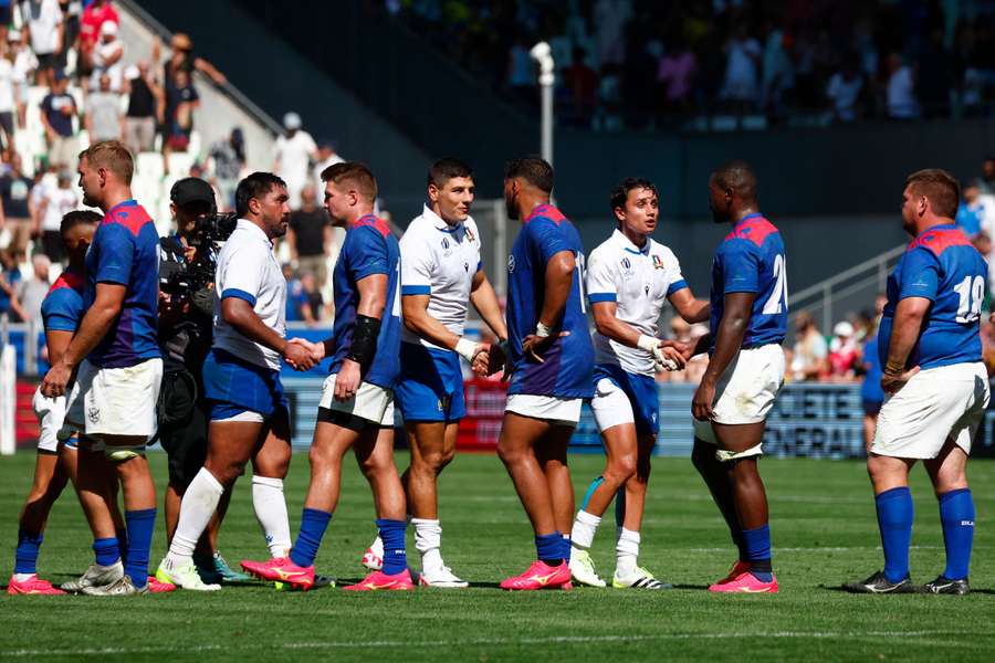 Namibia and Italy shake hands following their World Cup opener