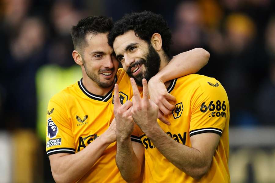 Wolverhampton Wanderers' Rayan Ait-Nouri (right) celebrates scoring their side's first goal of the game