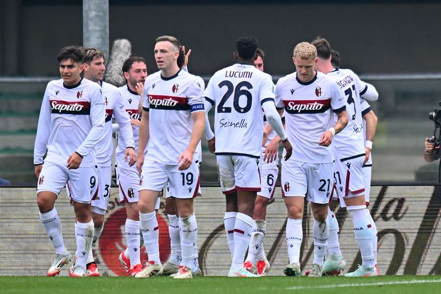 Bologna players celebrate their opening goal