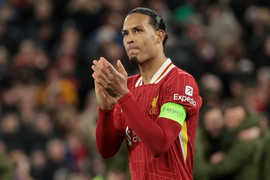 Virgil Van Dijk applauds supporters after Liverpool's penalty shootout defeat to PSG on Tuesday