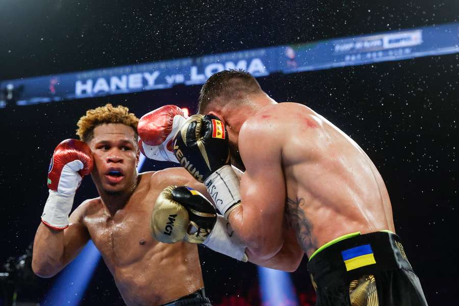 Devin Haney exchanges punches with Vasyl Lomachenko of Ukraine during their undisputed lightweight title bout