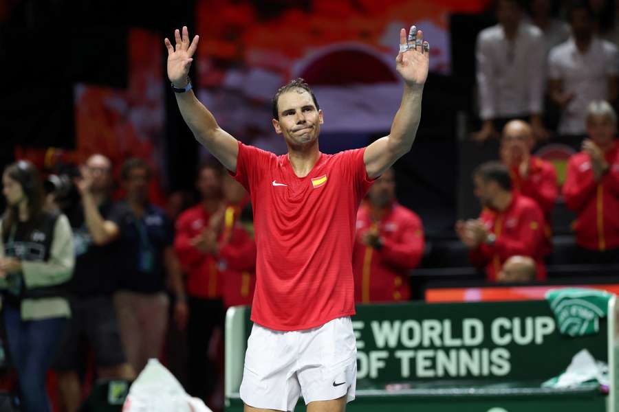 Nadal waves to the fans after his defeat in the Davis Cup