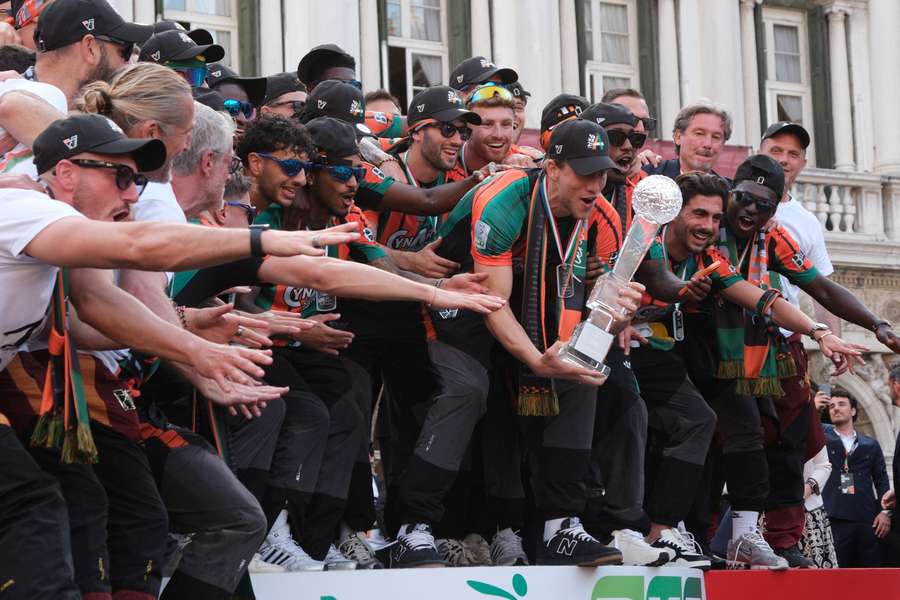 The Venezia squad celebrate on the historic Venice canals The Venezia squad celebrate on the historic Venice canals