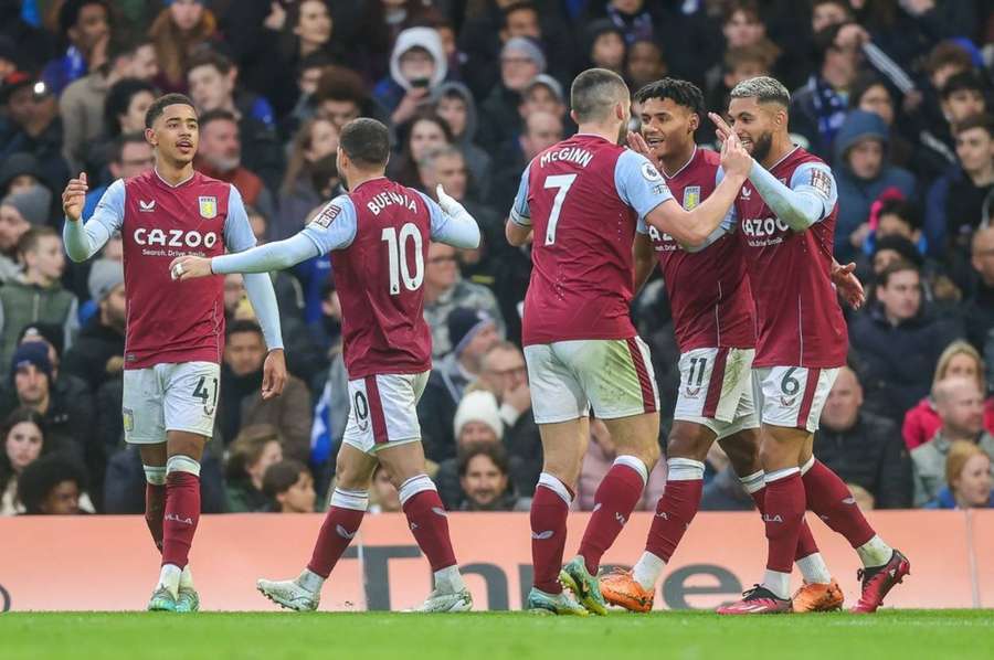 John McGinn celebrates with teammates after putting Aston Villa 2-0 up