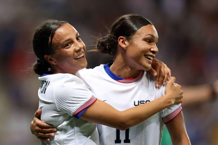 Mallory Swanson of United States celebrates scoring a goal with Sophia Smith