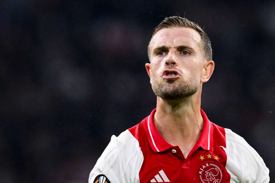 English midfielder #06 Jordan Henderson reacts during the UEFA Europa League football match between Ajax and Besiktas 