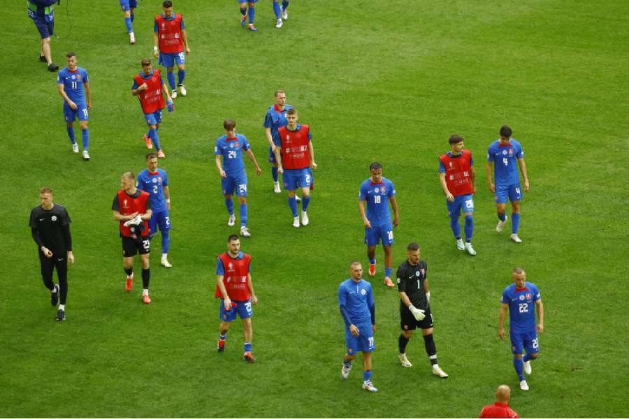  Slovakia players look dejected after the match 