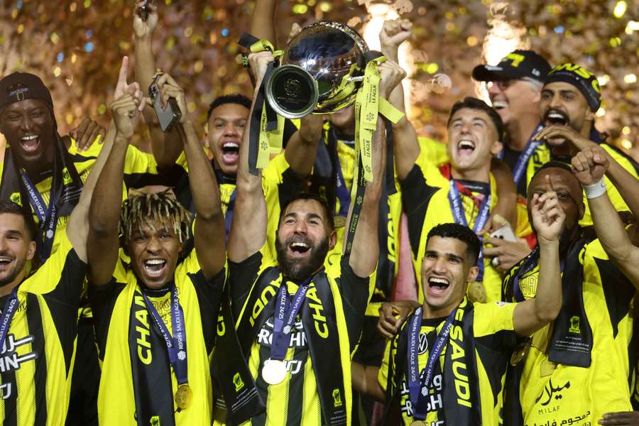 Al Ittihad's Karim Benzema (centre) lifts the Saudi Pro League trophy last season Al Ittihad's Karim Benzema (centre) lifts the Saudi Pro League trophy last season