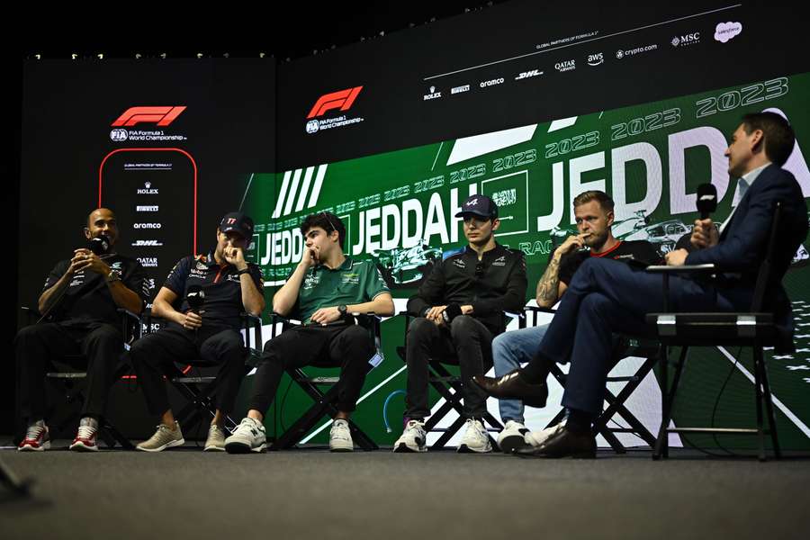 Mercedes' British driver Lewis Hamilton, Red Bull Racing's Mexican driver Sergio Perez, Aston Martin's Canadian driver Lance Stroll, Alpine's French driver Esteban Ocon, and Haas F1 Team's Danish driver Kevin Magnussen attend a press conference