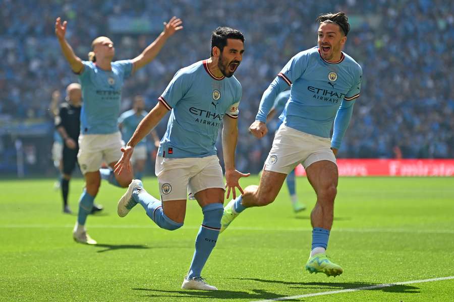 Ilkay Gundogan celebrates scoring after just 12 seconds - the quickest goal in FA Cup final history