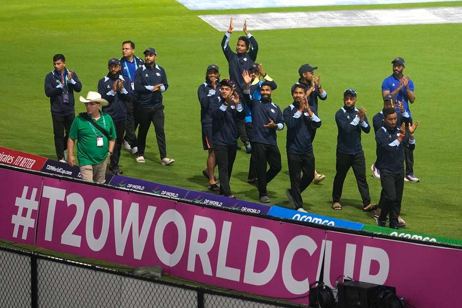 Nepal's players walk round the pitch