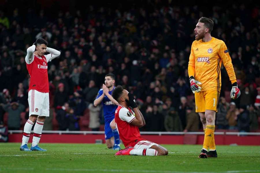 Pierre-Emerick Aubameyang of Arsenal holds his head in hands after missing an opportunity in the dying moments in 2020