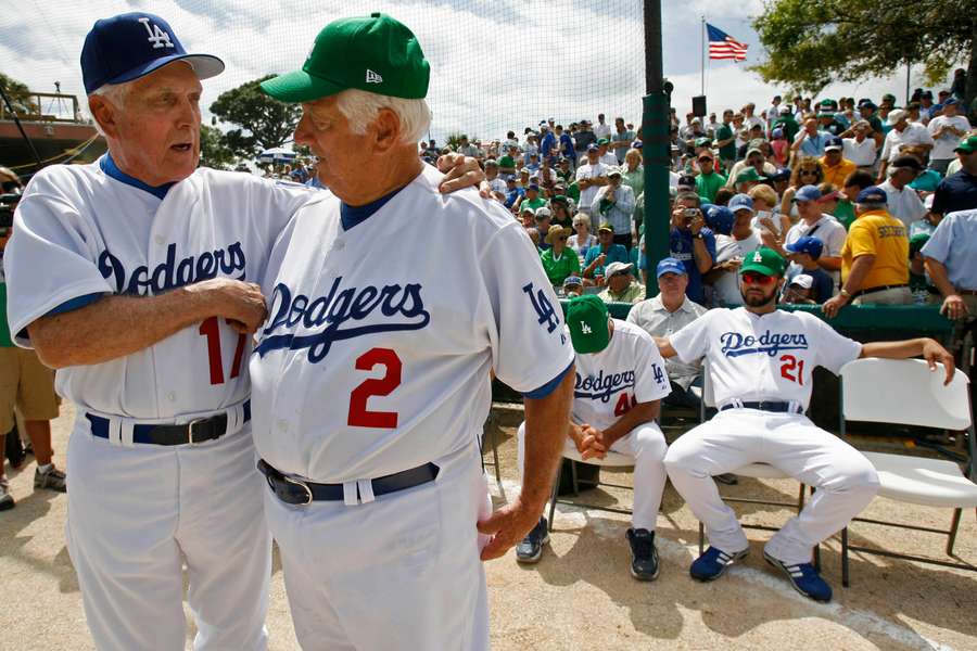 Carl Erskine, left, talks with Tommy Lasorda prior to the final game at Dodgertown against the Houston Astros in Vero Beach, Florida March 17th, 2008