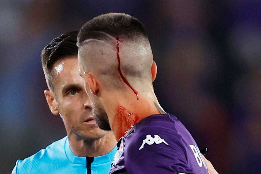 Cristiano Biraghi was hit by a cup during the final on Wednesday that left him bleeding