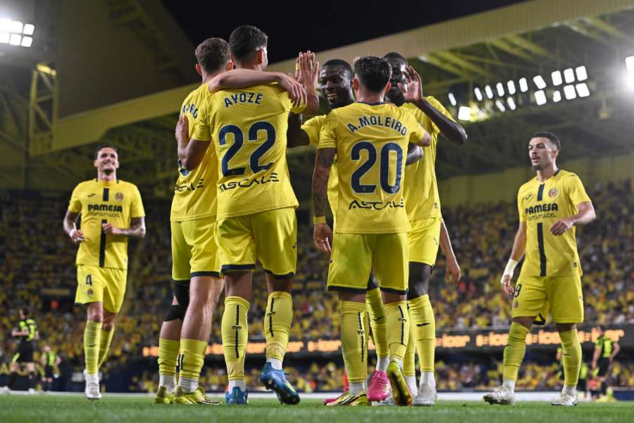 Villarreal's Ayoze Perez celebrates scoring their fifth goal with teammates