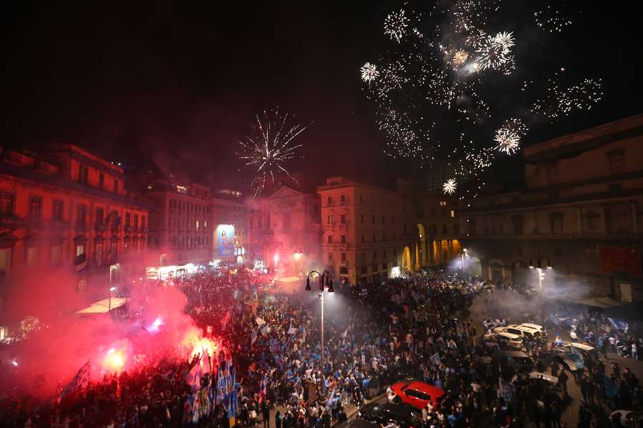 Napoli fans celebrate with fireworks