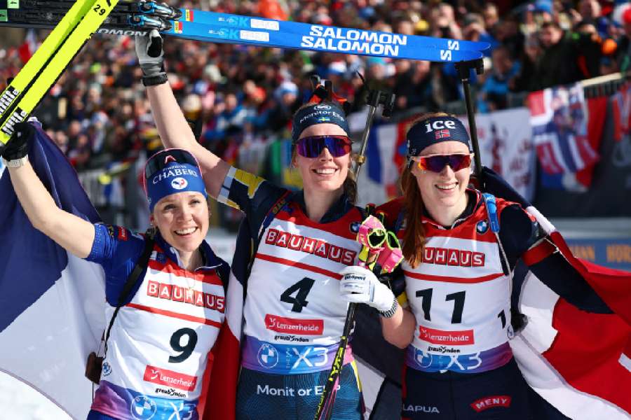 Elvira Oeberg celebrates after winning the Women 12.5 km Mass Start Competition