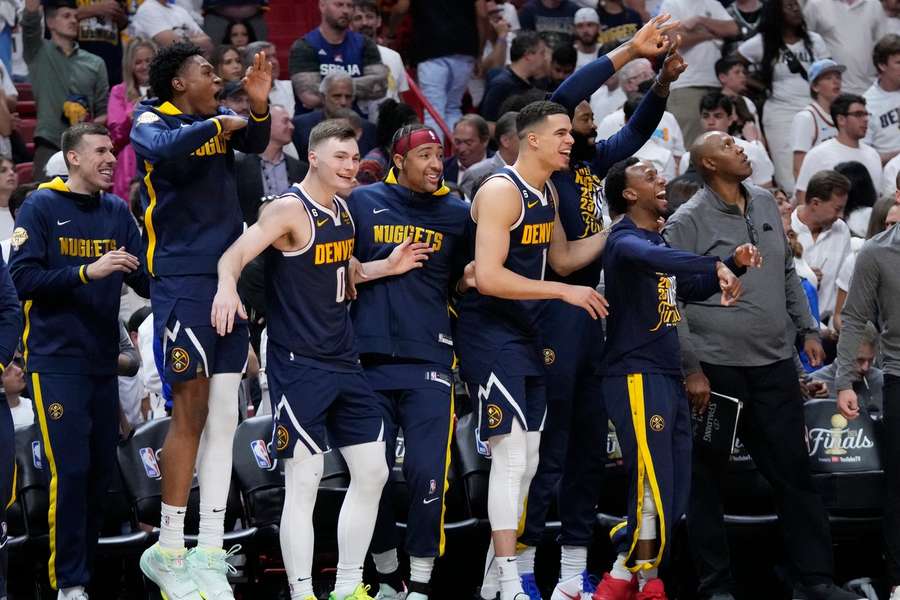 The Nuggets celebrate during game four against Miami