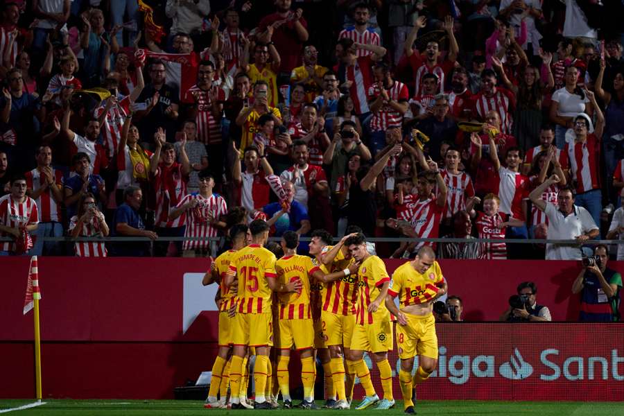 Girona celebrate the opening goal against Real Valladolid