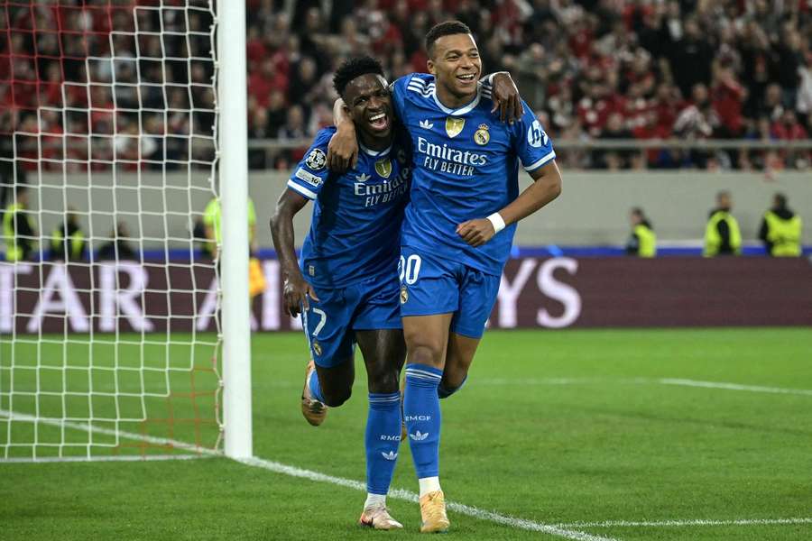Kylian Mbappe and Vinicius Junior celebrate