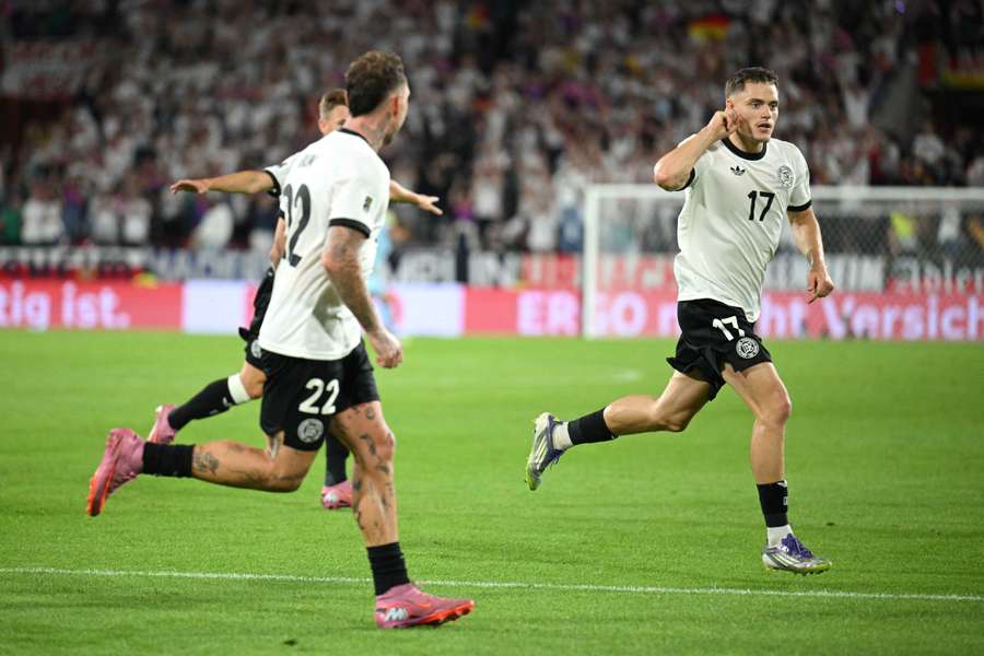 Florian Wirtz celebrates scoring a fantastic free-kick to give Germany a 3-1 lead