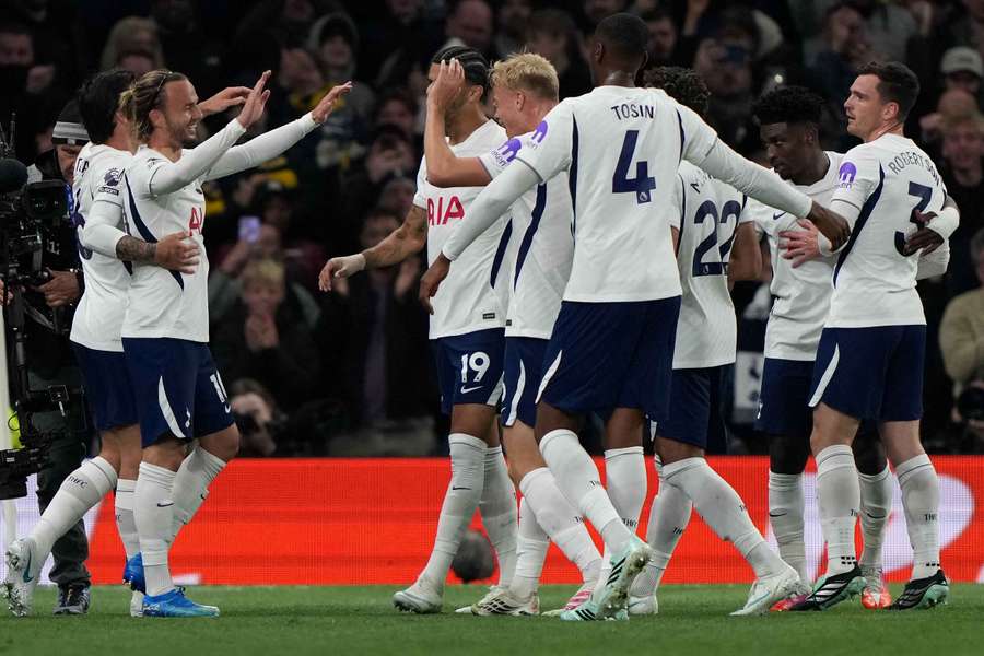 James Maddison celebrates with teammates after scoring the opening goal
