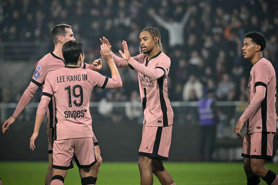 Paris Saint-Germain's French forward Bradley Barcola celebrates scoring his team's third goal