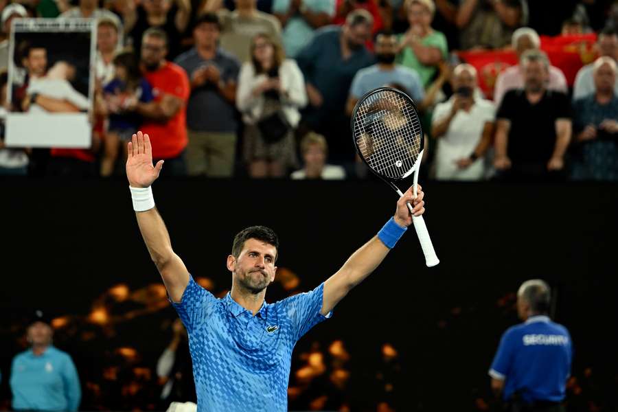 Serbia's Novak Djokovic celebrates victory against Australia's Alex De Minaur