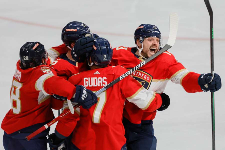 The Panthers celebrate their win