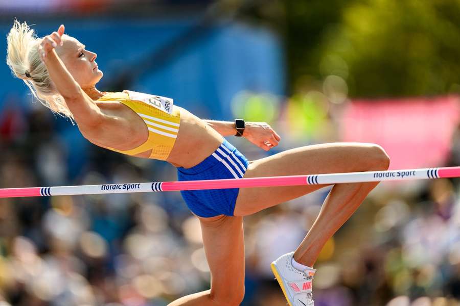 Louise Ekman sails over the bar en route to finishing first in qualification