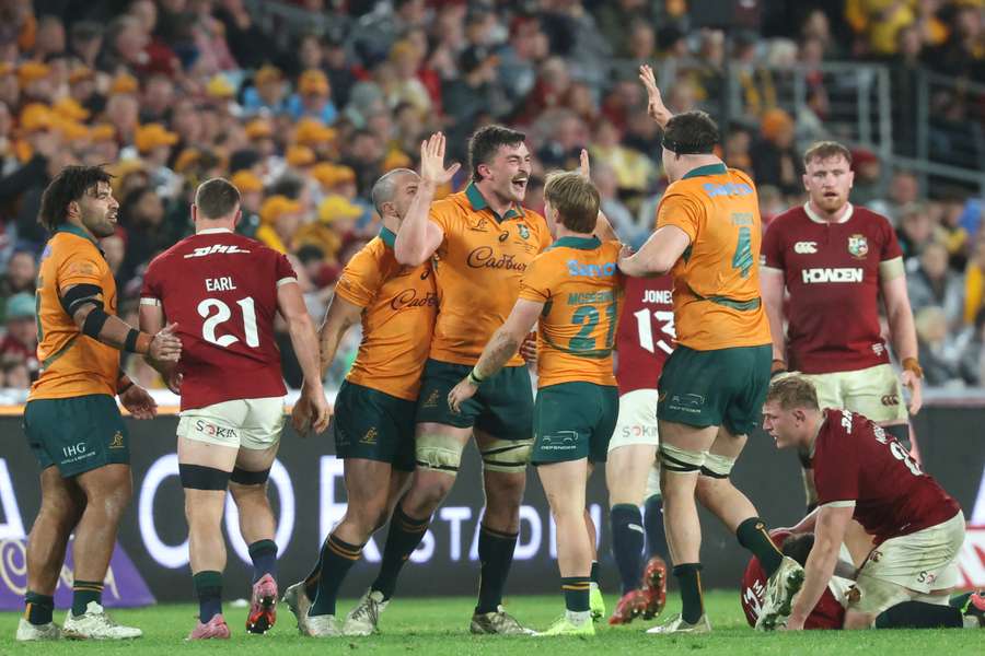 Australian player Jeremy Williams celebrates with teammates during the third Test match between Australia and the British and Irish Lions